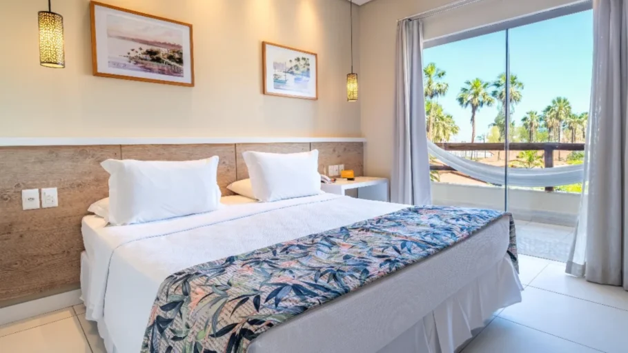 Cama de casal com vista da varanda